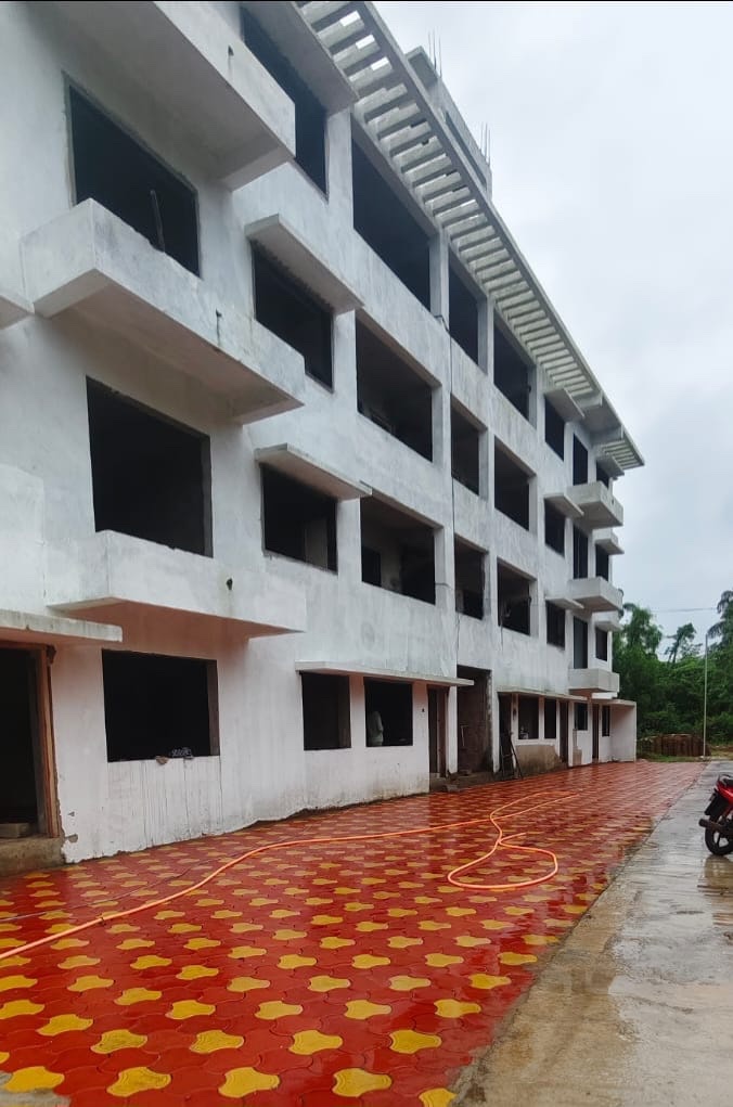 Interlocking paver walkway laid alongside Paradise Homes B Wing